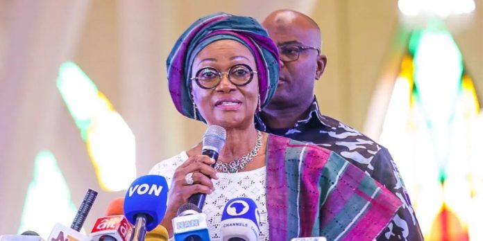 Remi Tinubu begs Nigerians to give her husband two more years, says his government not the cause of hardship