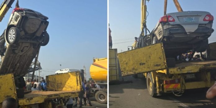 Driver escapes death as 40ft container falls on car in Lagos (Video)